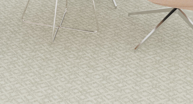 Tone on tone rug in worsted yarn with bamboo.